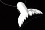 Howlite pendant – Dolphin tail